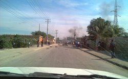 "Es fühlt sich an wie die Ruhe vor dem Sturm, denn wir kommen – so habe ich das nie vorher erlebt – ohne Stau durch Port-au-Prince." Foto: humedica/Wolfgang Groß