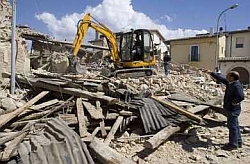 Verzweifelte Suche nach Überlebenden: das Erdbeben in den Abruzzen hat verheerende Ausmaße. Foto: alernet.org/REUTERS